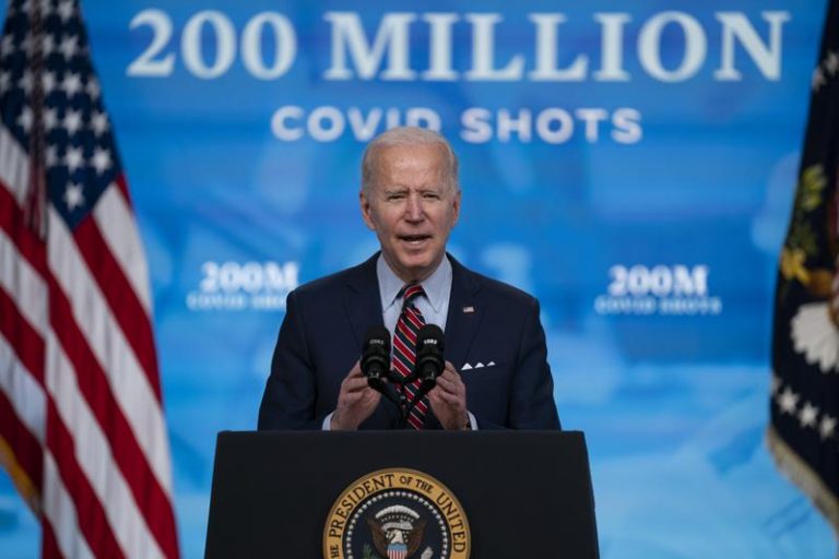 In this April 21, 2021, file photo, President Joe Biden speaks about COVID-19 vaccinations at the White House, in Washington. In April, the Biden administration announced plans to share millions of vaccine doses with the world by the end of June. Five weeks later, nations around the globe are still waiting to learn where the vaccines will go and how they will be distributed. (AP Photo/Evan Vucci, File)