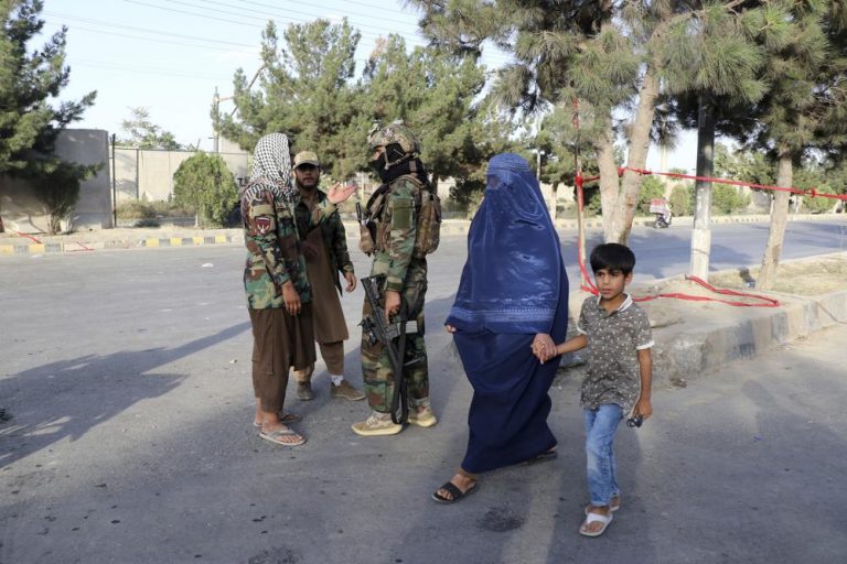 Sal Mohammad, 25, an Afghan man who gathers pieces of iron from the street to sell for scrap, pushes his handcart in Kabul, Afghanistan, Tuesday, Aug. 31, 2021. (AP Photo/Sayed Ziarmal Hashemi)